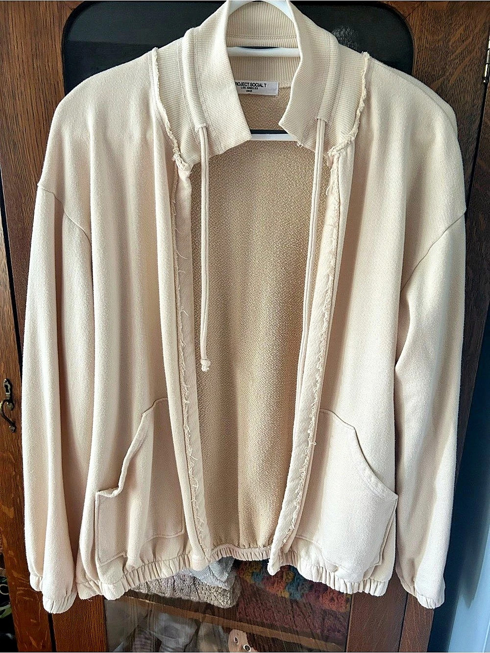 Project Social T Los Angeles Cotton Blend Open Front Bomber Sweatshirt in Cream